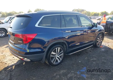 2016 Honda Pilot Touring z USA, uszkodzony, nr VIN 5FNYF5H90GB010900